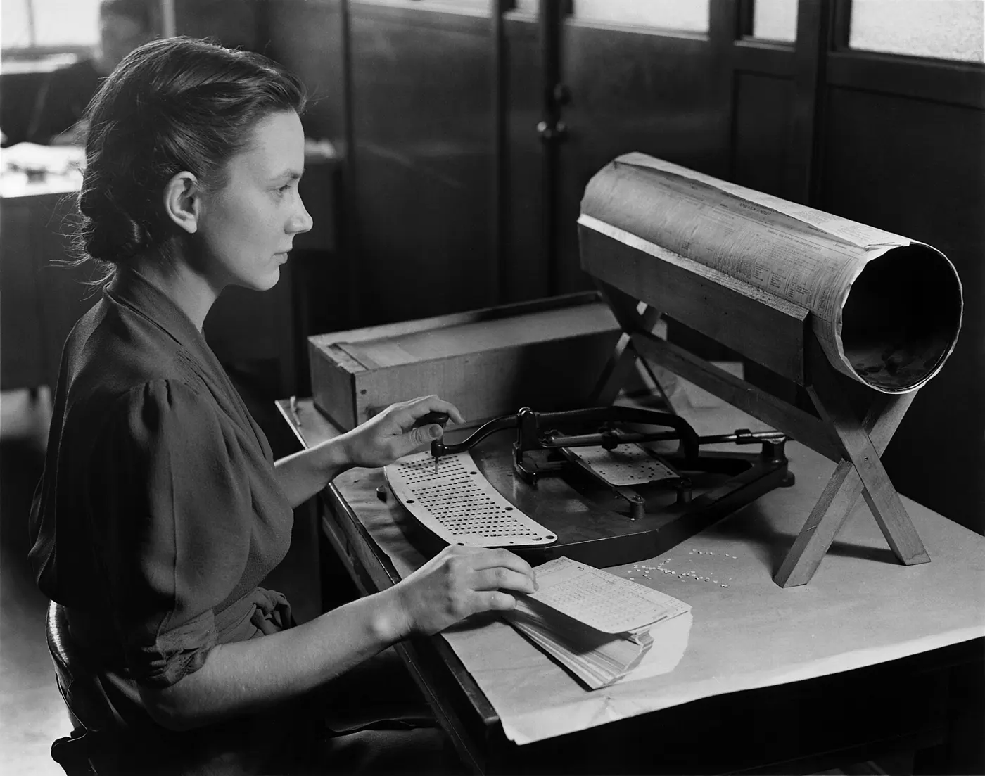 A card punch operator at a census keyboard, about 1940