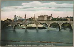 A 1906 postcard of the Stone Arch Bridge and the mills