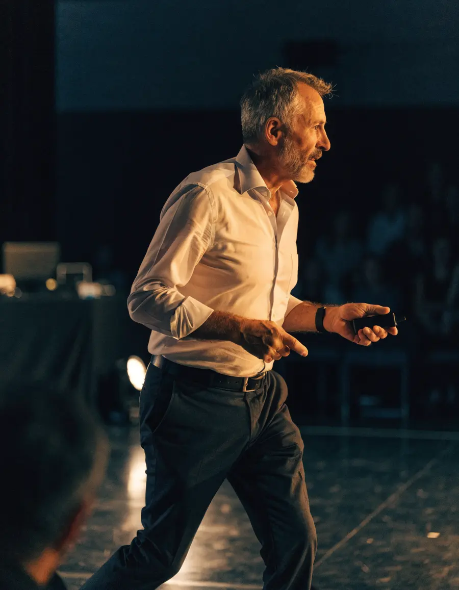 Marcus Lindqvist on stage with a clicker