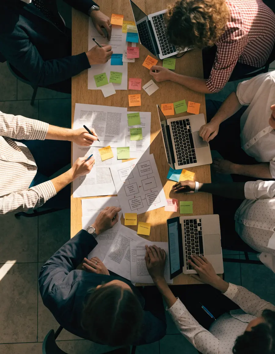 The process mapping workshop, sticky notes on the table