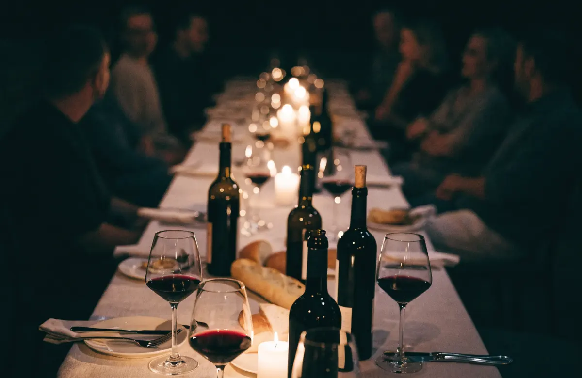 A long table set for a wine dinner