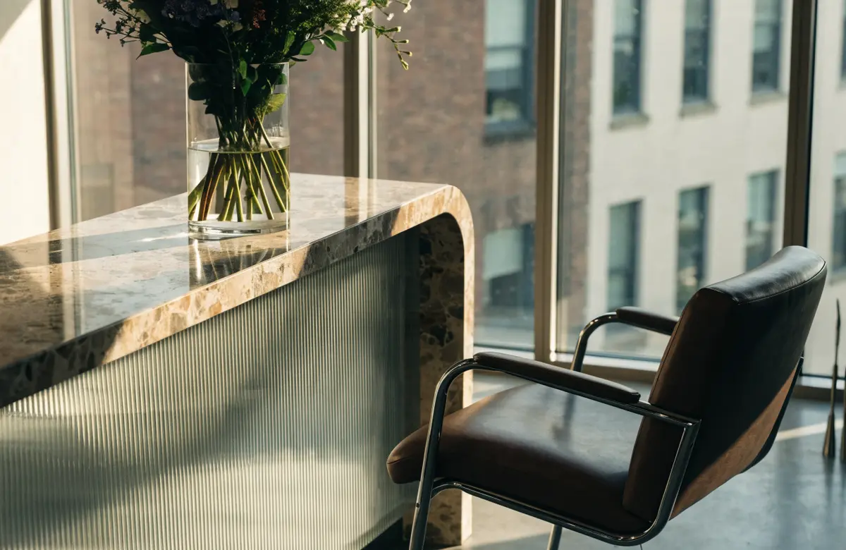 The studio's reception desk with flowers