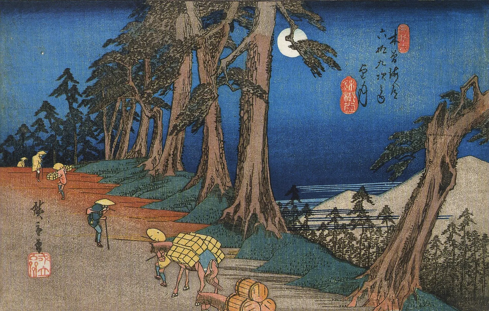 Hiroshige print of porters and travellers climbing a slope under pines by moonlight